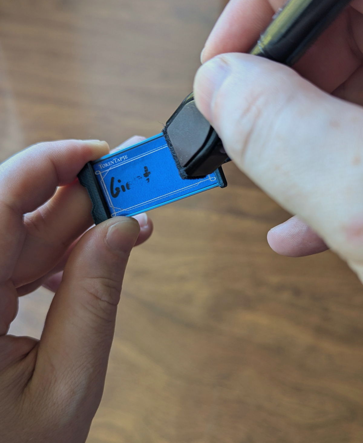 The same TokenTab being wiped clean, the writing half gone.